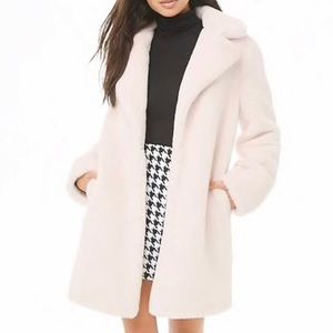 White faux fur coat